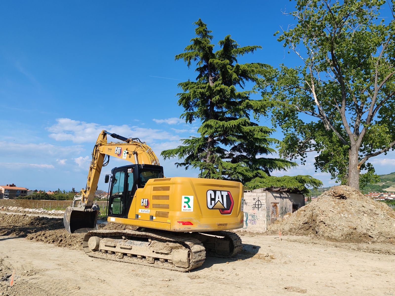 Excavator on a cleared building site